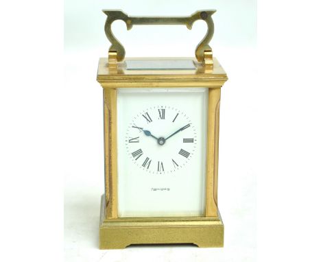 A circa 1900 brass carriage clock, the rectangular face with circular chapter ring set with Roman numerals, inscribed 'Mappin