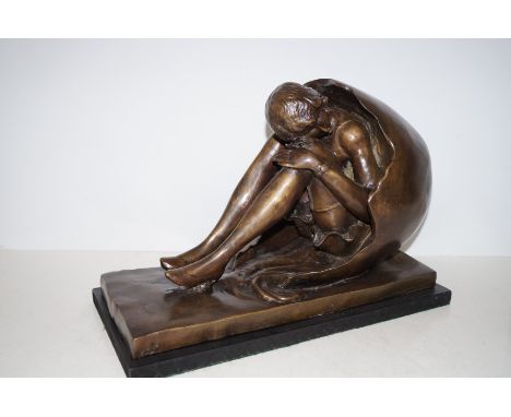 Large bronze figure of a lady sat in a egg shell 45x30cm
