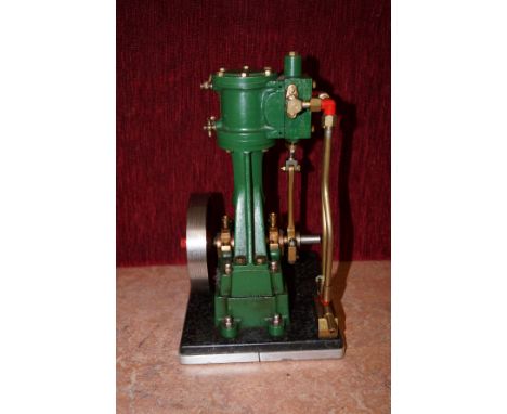 Well constructed heavy steam engine. All parts work and move. Height 26cm, Width 18cm. 