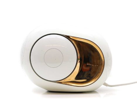 A Devialet 'Phantom' speaker  of recent manufacture, in the 'Gold' colourway, 32cm wide 22cm deep 25cm high  Condition Report