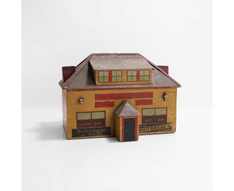 A folk art model of 'The Cauliflower' English pub, 1930s, hand-painted, made from a solid oak beam and roofing lead, possibly