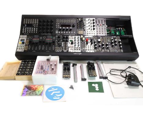 A modular synthesiser, including an Erica Synths 'Black Sequencer', an Erica Synths 'LXR DRUM, Sonic Potions', an Intellijel 