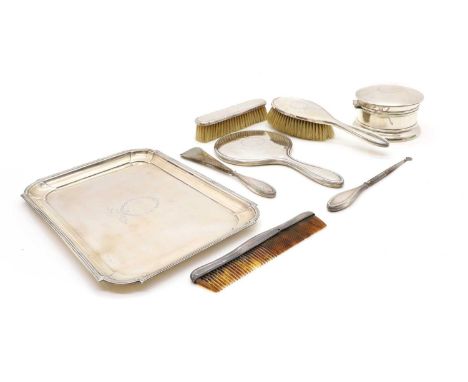 A silver mounted matched dressing table set,   to include a tray by A & J Zimmerman Ltd, Birmingham 1916, 31 x 21cm, a dressi