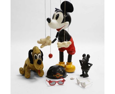 A group of six Walt Disney items, 1930s and later, a collection of Walt Disney pieces, including an early Mickey Mouse cast i