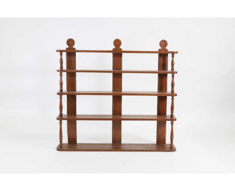 A six tier open wall hanging shelf, 19th century, 121cm wide 24cm deep136cm high