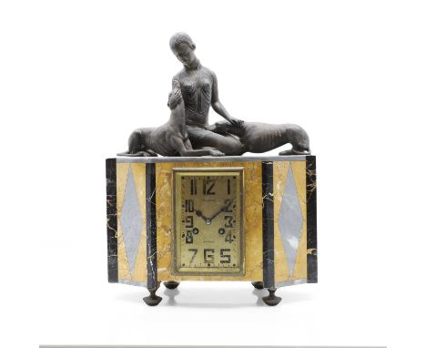 An Art Deco spelter and marble mantle clock, early 20th century, French, of rectangle form with canted edges, raised on four 