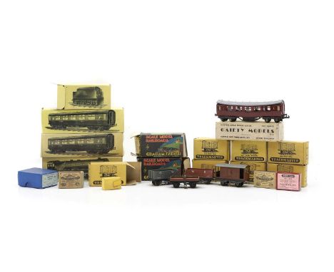 A collection of railway rolling stock, comprising;a Gaiety Model OO Electric 0-6-0 Tanker, boxed;six Trackmaster wagons, all 