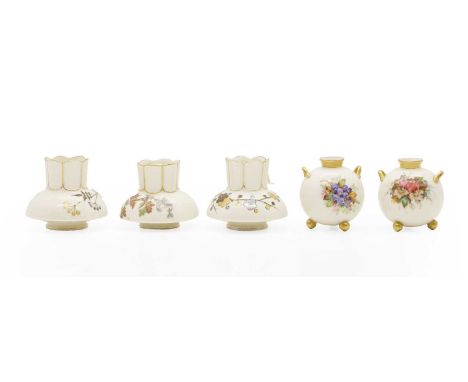 A group of three Royal Worcester porcelain vases, late 19th century, each of squat domed form with a faceted neck, each decor