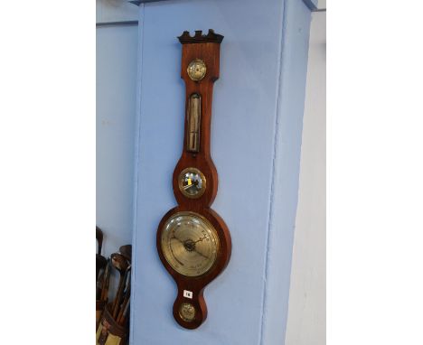 A mahogany banjo barometer