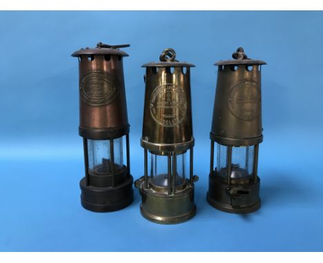 Two Eccles miners lamps and an E. Thomas Williams Ltd lamp (3)