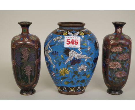 A Japanese cloisonne enamel vase,&nbsp;decorated with cranes, 15cm high;&nbsp;together with&nbsp;another pair of Japanese clo