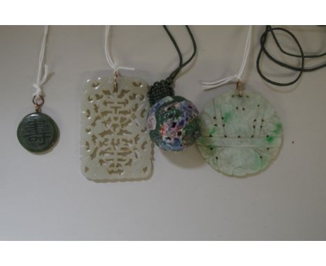A Chinese carved and pierced pale celadon jade pendant,&nbsp;6.2 x 4.4cm;&nbsp;together with&nbsp;another carved and pierced 