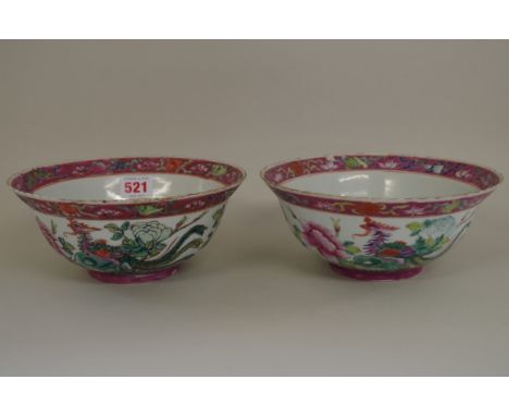 A matched pair of Chinese famille rose phoenix bowls,Â&nbsp;Qianlong seal marks,Â&nbsp;20cm diameter, (2). 