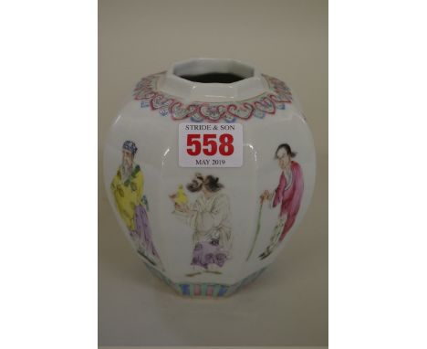 A Chinese famille rose octagonal jar,&nbsp;each facet painted with a figure, 13cm high.&nbsp; 