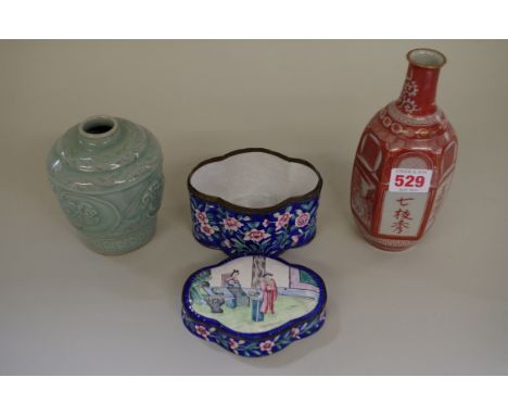 A Chinese Canton enamel quatrefoil box and cover,Â&nbsp;11.5cm wide; together withÂ&nbsp;a celadon vase, 11.5cm high; and a J