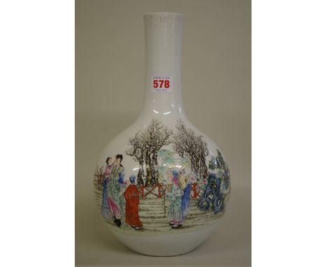 A Chinese famille rose bottle vase,Â&nbsp;QinglongÂ&nbsp;seal mark, painted with a lady and attendants in a garden, 33cm high