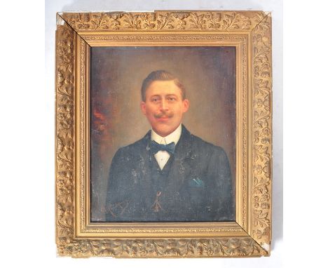 A 19th Century French School antique oil on canvas painting portrait study depicting a gentleman sporting a moustache in blac