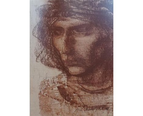 A framed Pietro Annigoni red chalk and water colour portrait of a young man. 