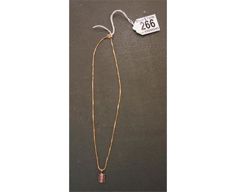 9ct Gold Diamond and Ruby Pendant with matching chain