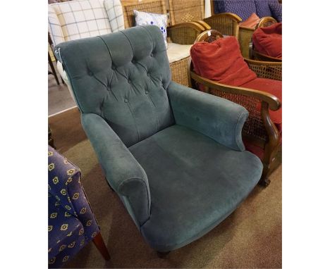 Victorian style Button backed armchair on turned feet 