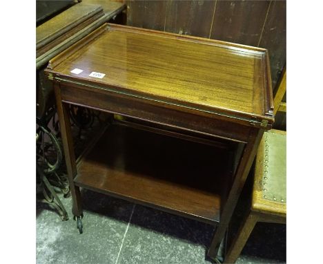 A Edwardian mahogany turn over top card table trolley 
