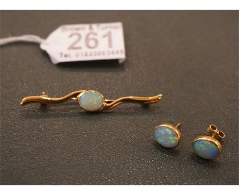 18ct Gold and Opal Bar Brooch and a Pair of 18ct Gold and Opal Earrings