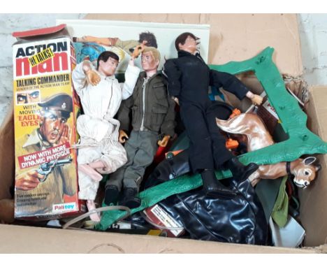 A box of mainly Action Man figures and other toys.
