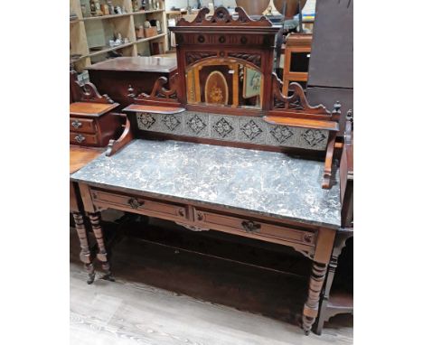 A late Victorian marble top and tile back mahogany wash stand, width 122cm, depth 56cm, height 143cm.  