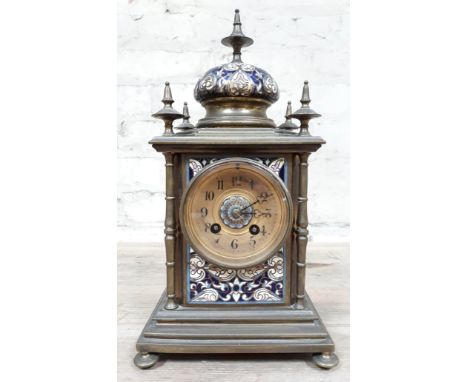 A French late 19th Century champleve enamel and brass mantle clock, height 29cm.  