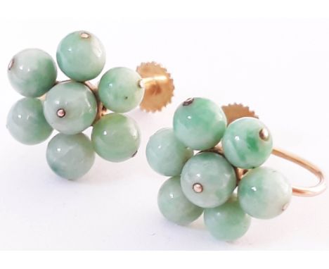 A pair of gold and jade bead earrings, each with 7 small jade beads, diameter between 4-5 mm each, clasps marked 9ct, gross w