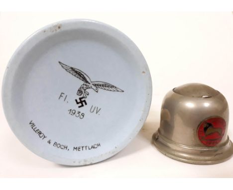 A German WWII Nazi Luftwaffe mug by Villeroy &amp; Boch, Mettlach, height 9.5cm, together with a silver plated inkwell with W