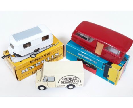 A group of three die cast/plastic model vehicles comprising a Marklin Wohnwagen 1824 caravan, boxed with instructions, a Rals