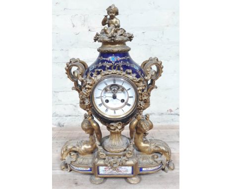 A French 19th Century gilt metal and porcelain mantle clock by Aubert & Klaftenberger, Geneve, blue porcelain ovoid body havi