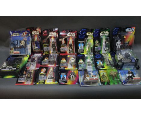 A collection of modern Star Wars carded action figures, to comprise Episode 1, Attack of the Clones, a 30th Anniversary coin 