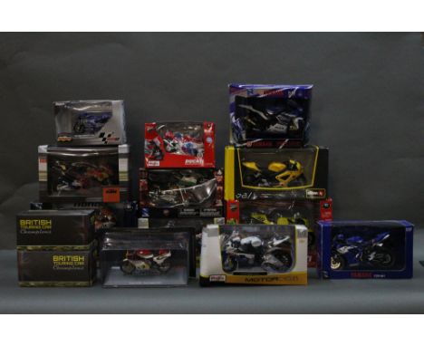 A group lot of boxed scale motorcycle models, to include KTM, Maisto, Newray, and British Touring Car Champions