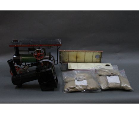 A Mamod steam tractor, together with spares