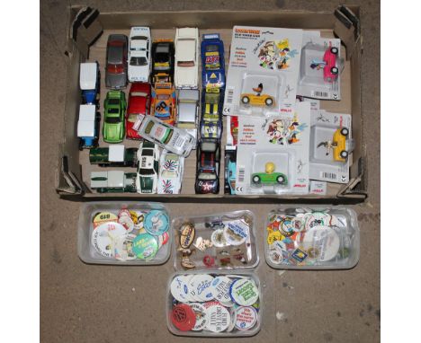 A box of modern Matchbox diecast cars, Looney Tunes, Old Timer cars, plus tubs of vintage badges