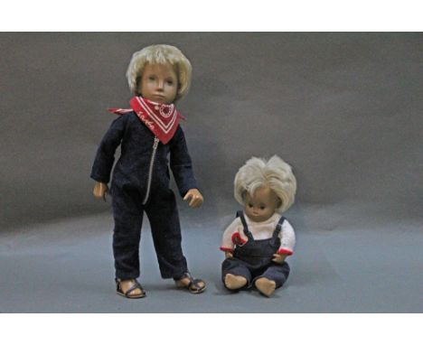 Two hard vinyl Sasha dolls, both having blonde rooted hair, comprising a Gregor doll and baby doll, the tallest measuring 38c