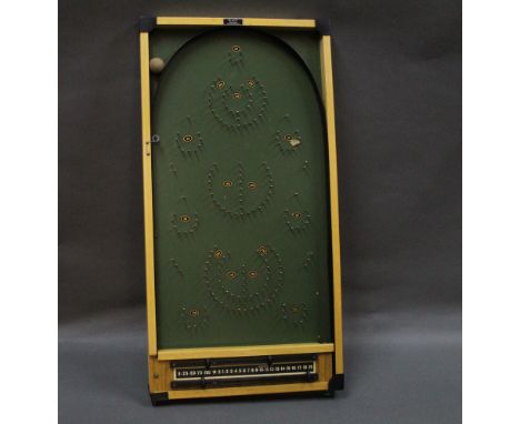 A Kay of London vintage bagatelle with ball and other accessories, measuring 76 cm long and 40 cm wide  