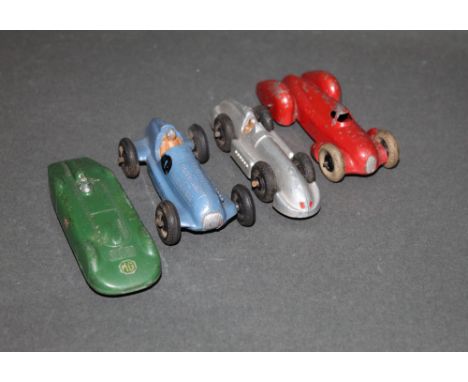 A group of four Dinky racing cars, to comprise a Mercedes-Benz (23C) in light blue, a "Speed of the Wind" (23E) in silver, an