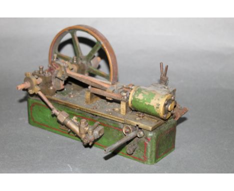 A horizontal stationary steam engine with green and red painted base, measuring 14 cm long