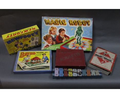 An assorted collection of vintage games, to include a Merit "The Amazing Magic Robot" game, a Bayko "0" building set, a John 