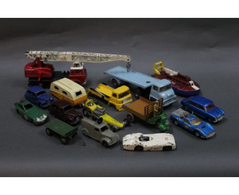 A group of mainly Dinky model vehicles, to include a Jones Fleetmaster Cantilever crane, a loud speaker van, and racing cars 