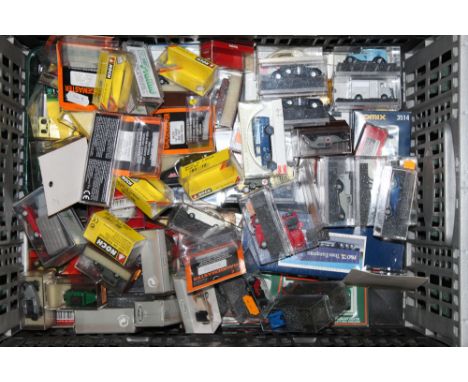 A box of +/- 80 scale model vehicles, by Busch, Herpa, Model Scene, and Peco  