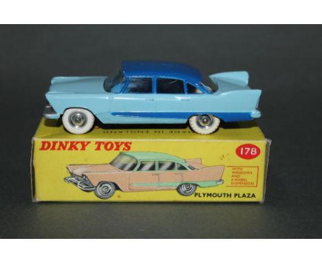 A Dinky Plymouth Plaza (178), having a light blue body, dark blue roof and side flash, with spun hubs, and displayed in its y