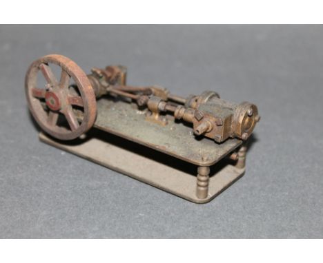 A small scale horizontal stationary engine, measuring 9 cm long. 