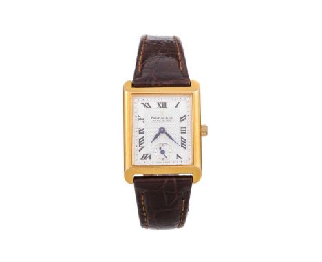 DREYFUSS & CO EIGHTEEN CARAT GOLD the square textured dial with Roman hour markers, outer seconds track in black, subsidiary 