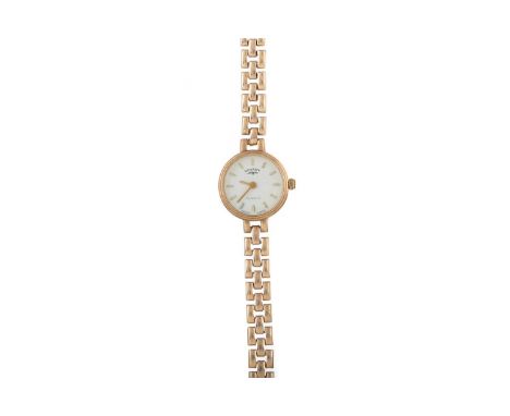 ROTARY NINE CARAT GOLD QUARTZ WRIST WATCH the round cream dial with baton hour markers, 17mm case, on a nine carat gold brace