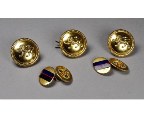 A pair of gilt and enamel cufflinks - bearing an armorial