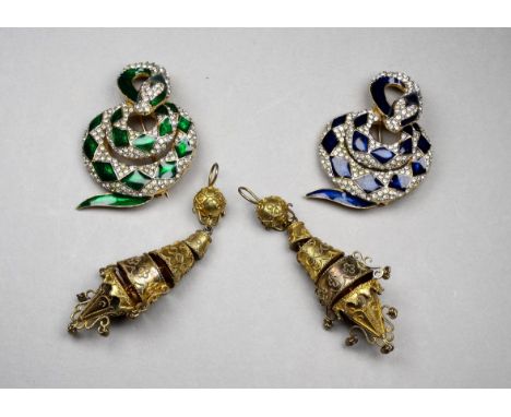 A serpent brooch by Atwood &amp; Sawyer - set with blue enamel diamond shapes on a white ground, together with another simila